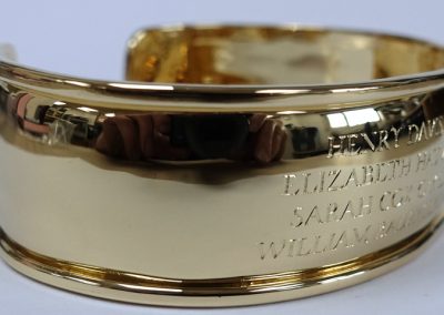 Gold bangle hand made and engraved with names